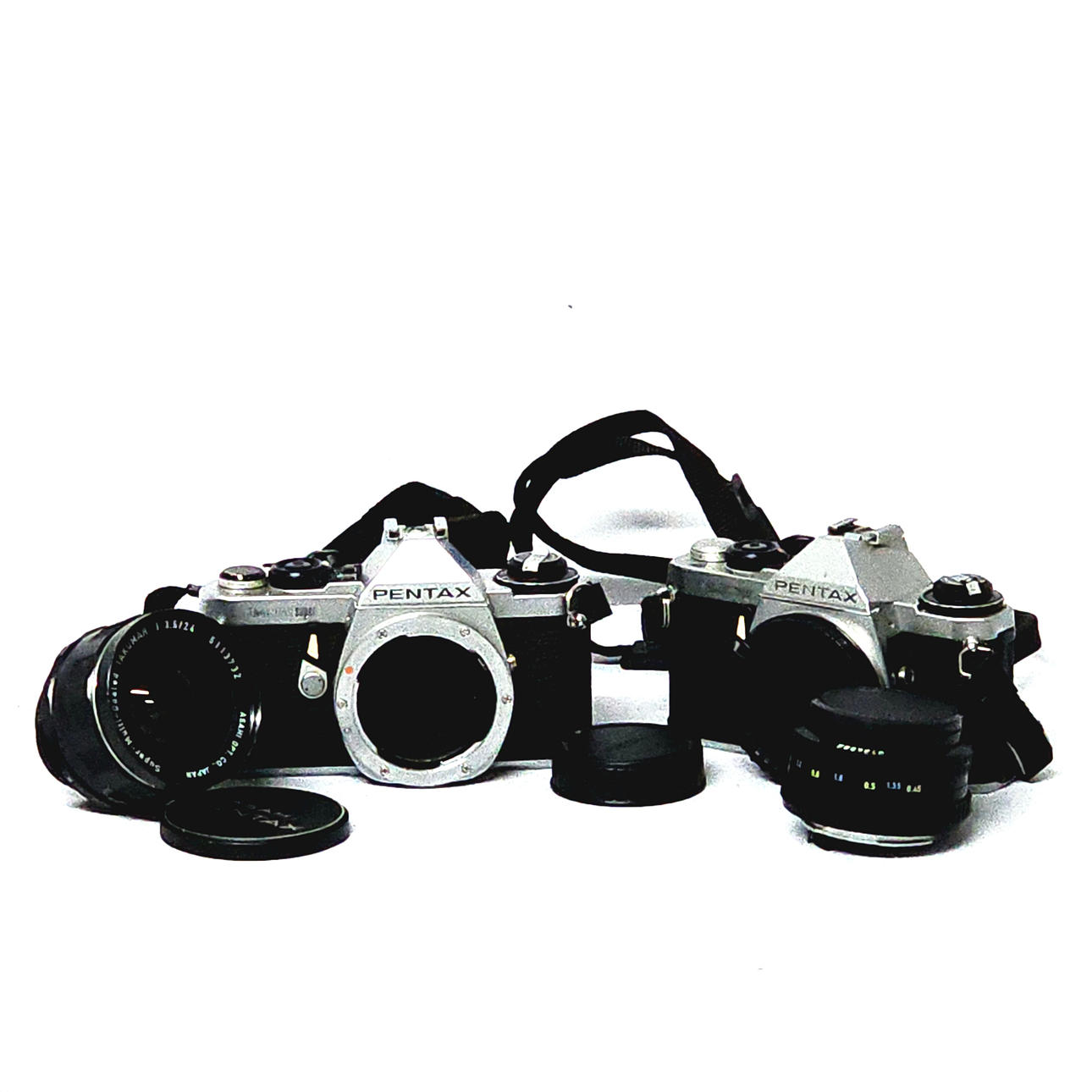 Two Asahi Pentax cameras with two lenses.