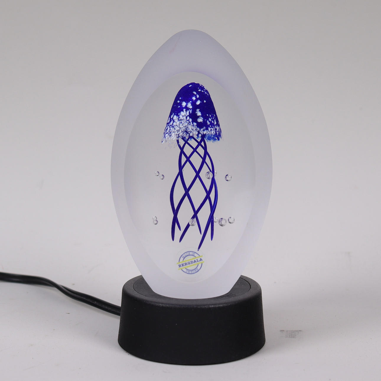 BREVPRESS, Bergdala, glas med manet.