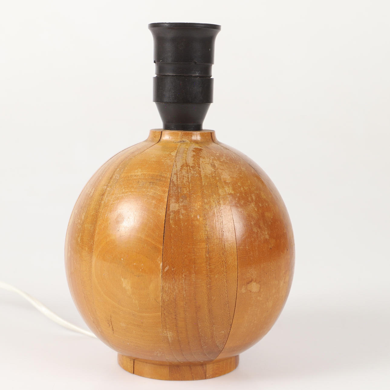 A table lamp, globe model, wood, 20th century.