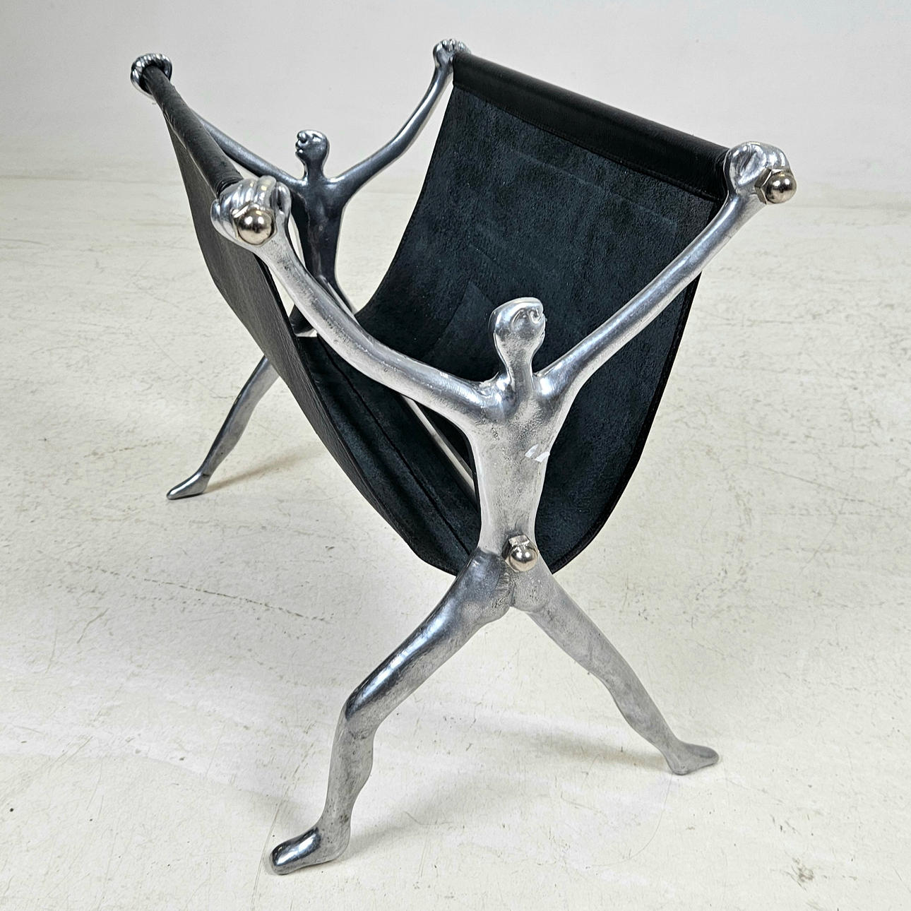 CARROL BOYES. Magazine rack, “Man”.