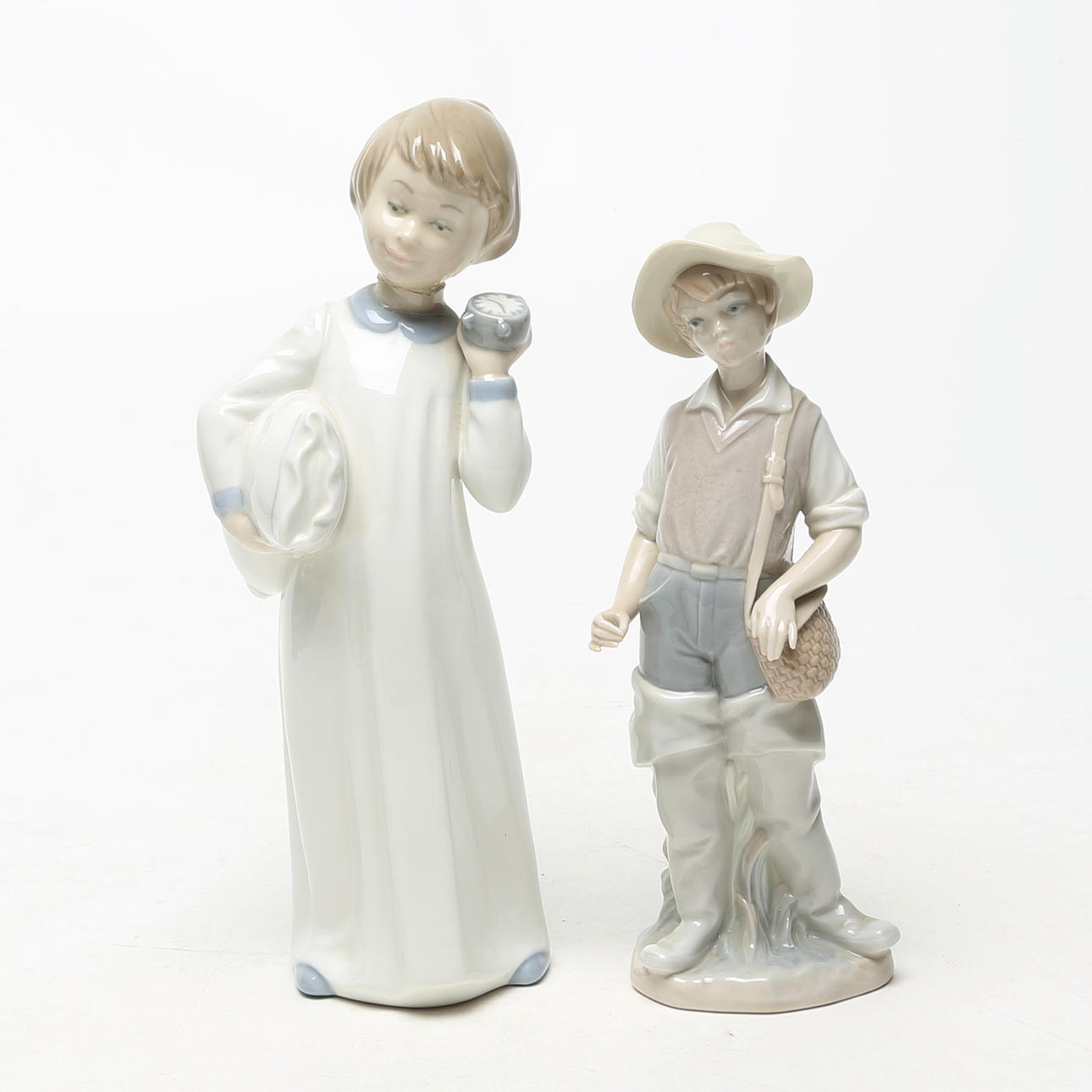 TWO PORCELAIN FIGURINES, Zaphir and Lladro.