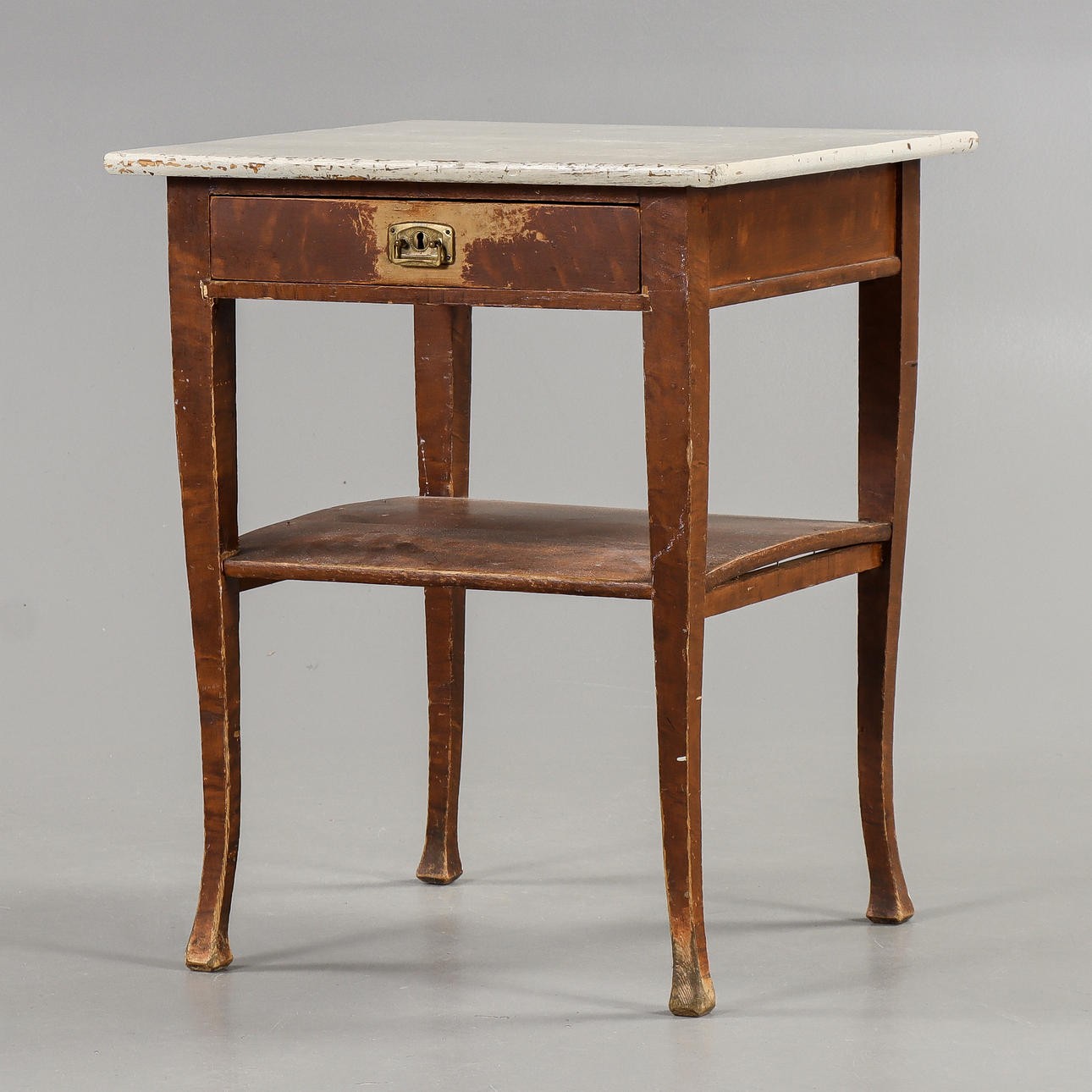 A table with a drawer, early 20th century.