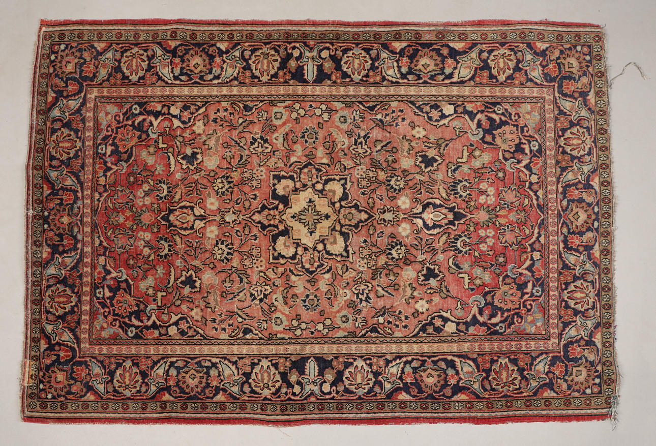 A PERSIAN ISFAHAN RUG.