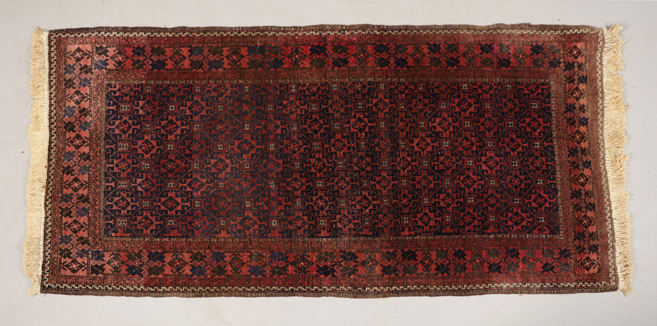A BALUCH RUG.