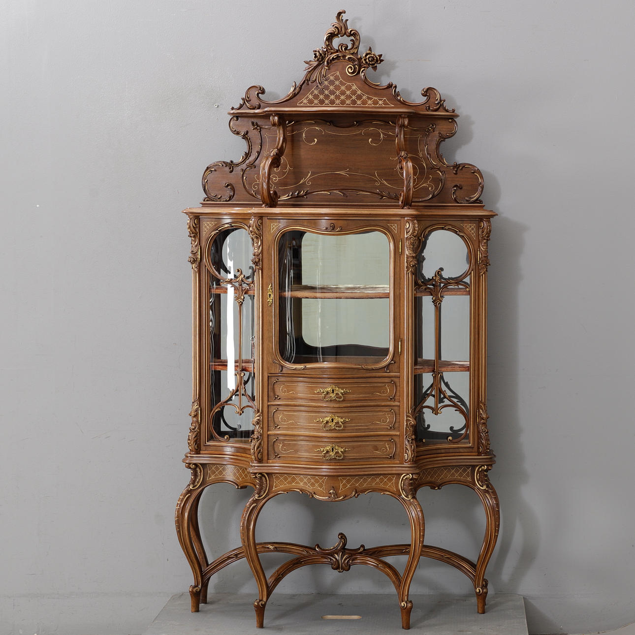 A rococo style display cabinet, 20th century.