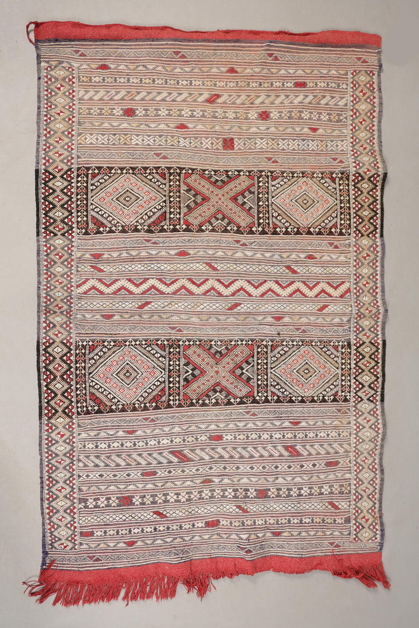 A SOUMAK-STYLE WALL HANGING/RUG.