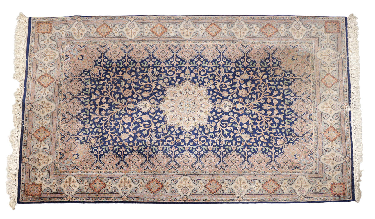 A NAIN RUG.