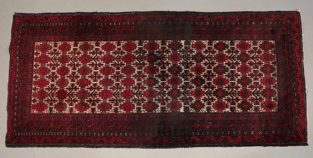 A BALUCH RUG.
