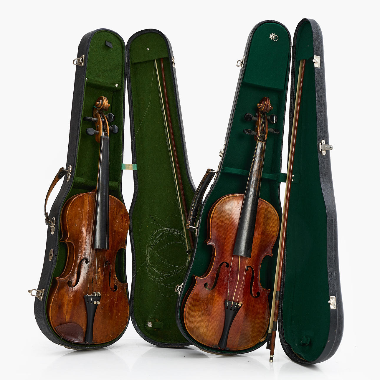 Two 19th century violins, in case.