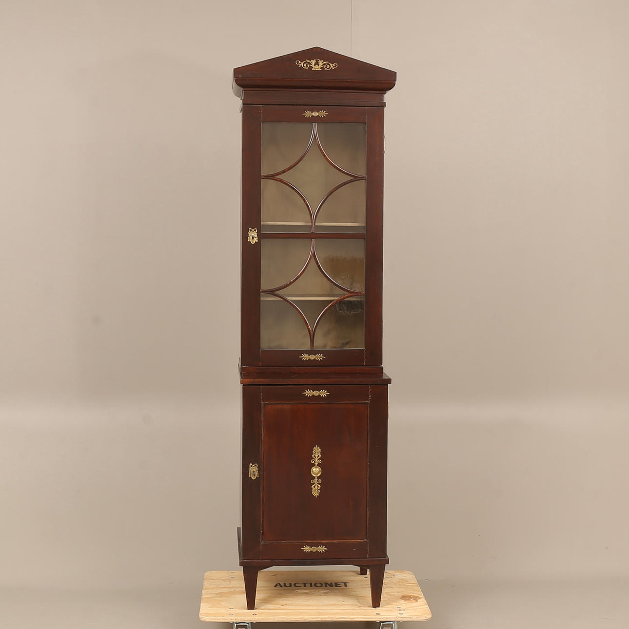 A 19th century display cabinet.