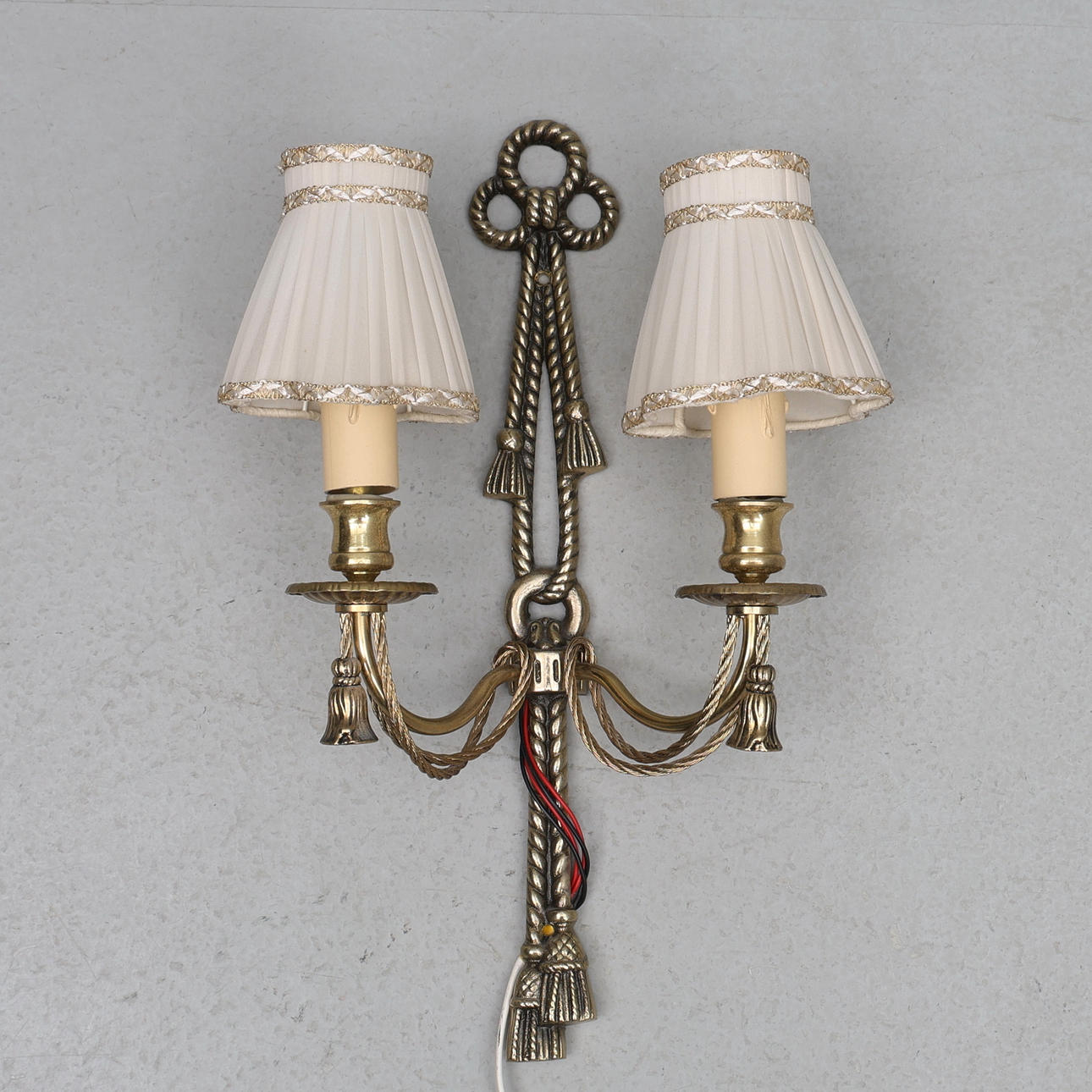 A brass two-armed wall sconce, 20th century.