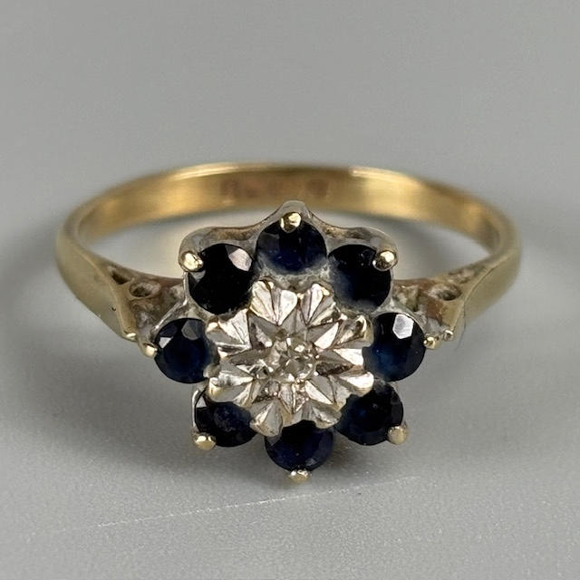 9CT GOLD SAPPHIRE AND DIAMOND RING.