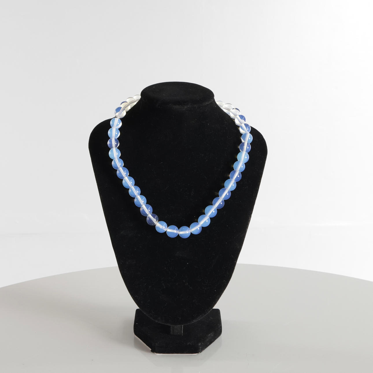 Necklace with clear opal beads.