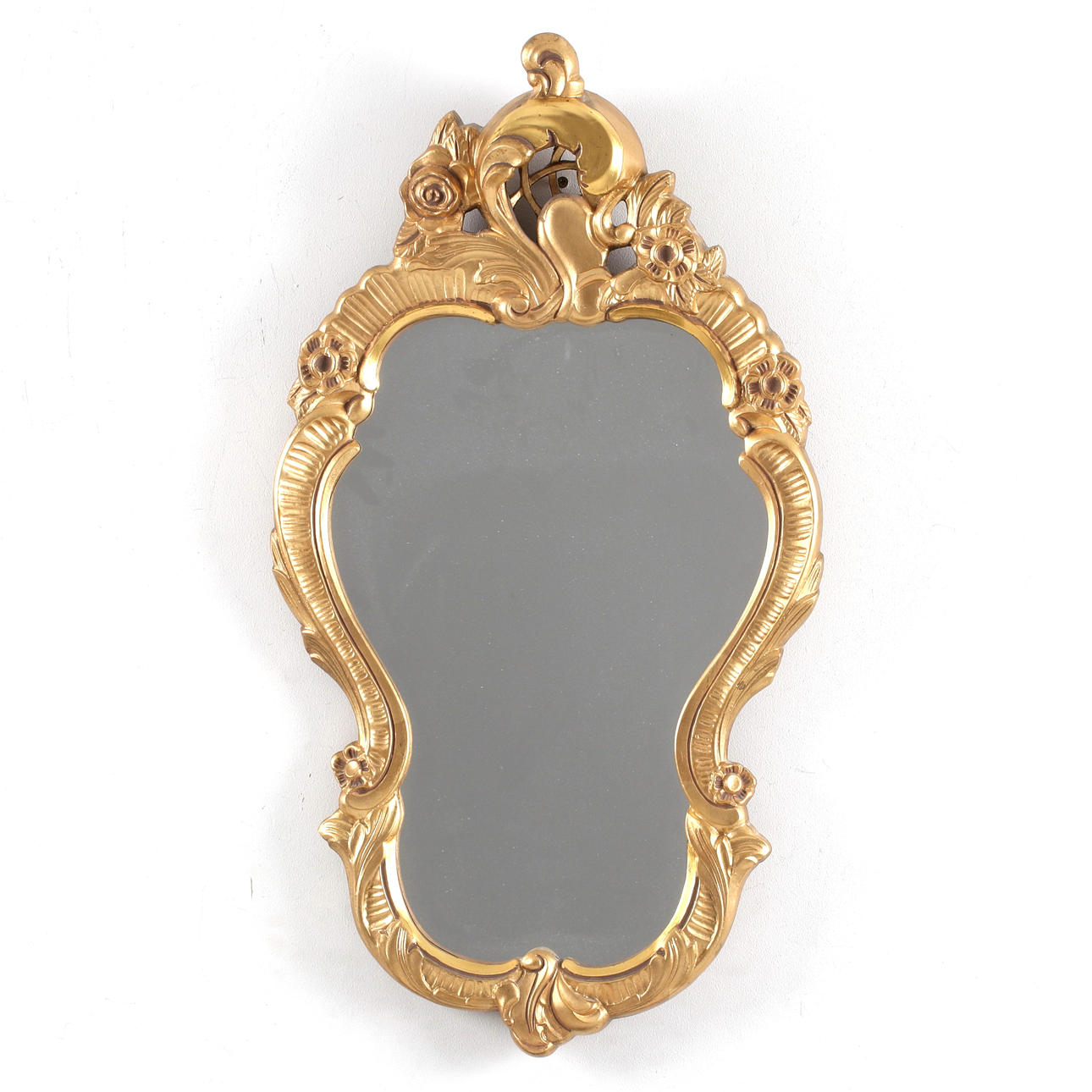 A 20th century rococo style mirror.