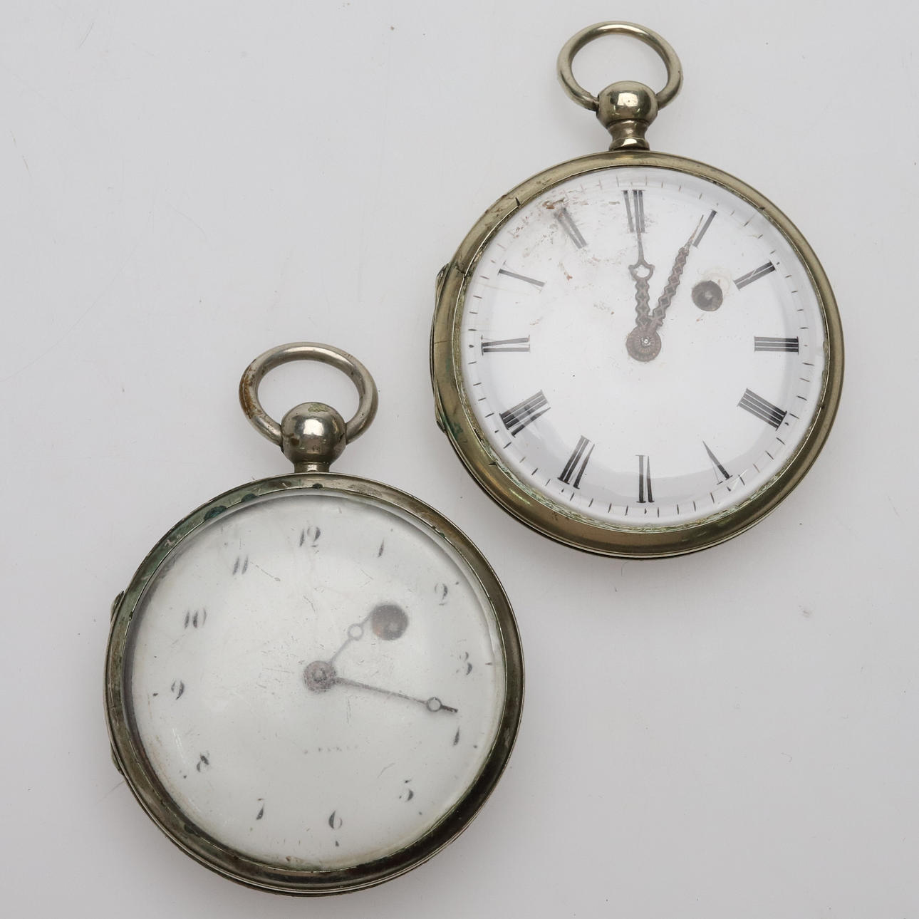 SPINDLE WATCH, 2 pieces, white metal.
