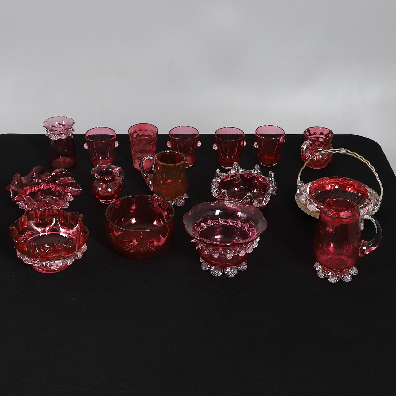 ASSORTED 19TH AND 20TH CENTURY CRANBERRY GLASS.