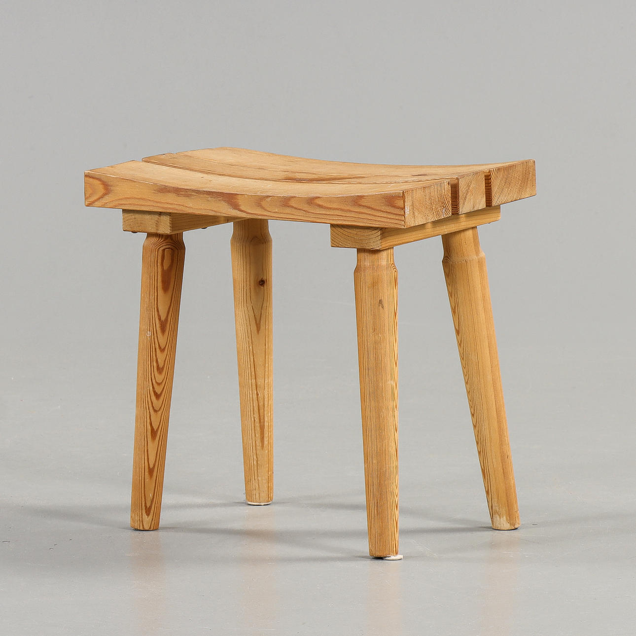 A pine stool, second half of the 20th century.