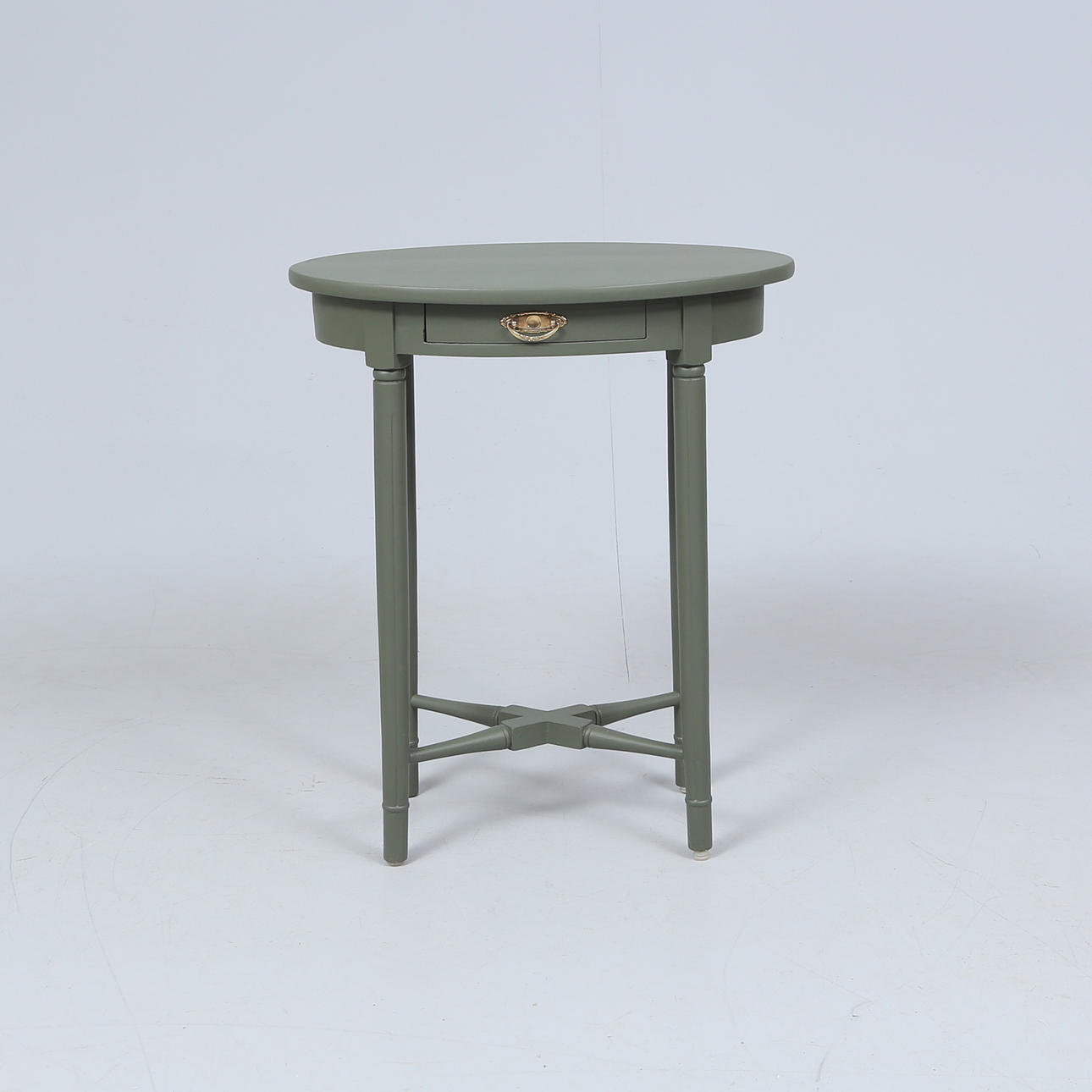 A Gustavian style painted bedside table.