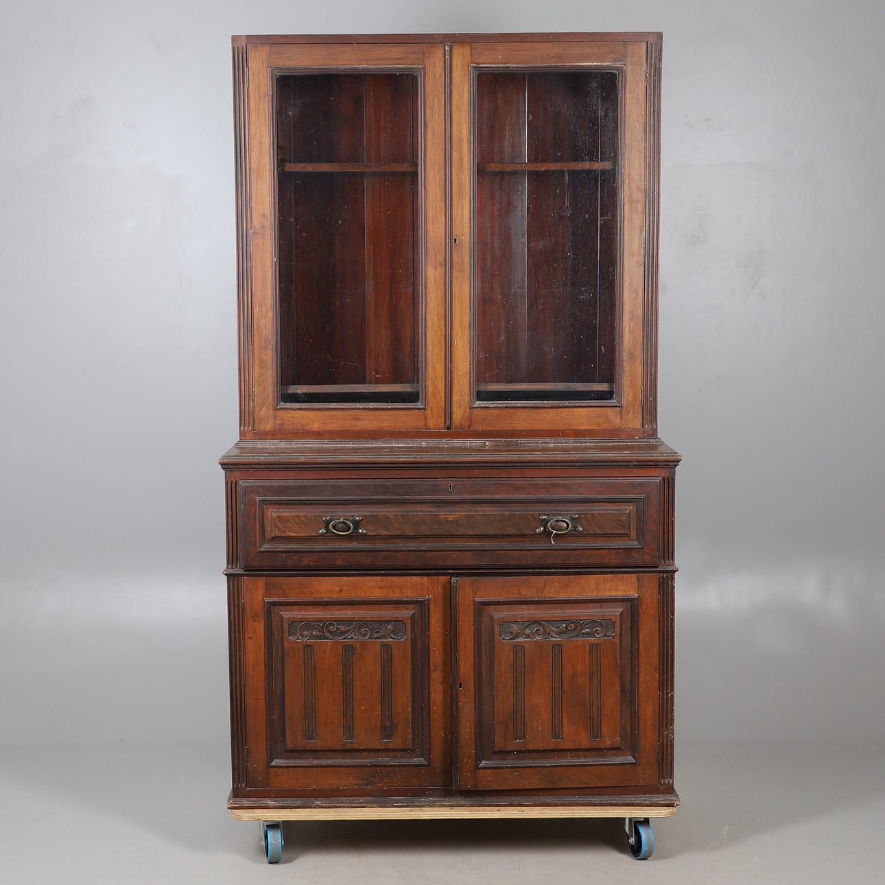 AN EDWARDIAN WALNUT SECRETAIRE BOOKCASE.