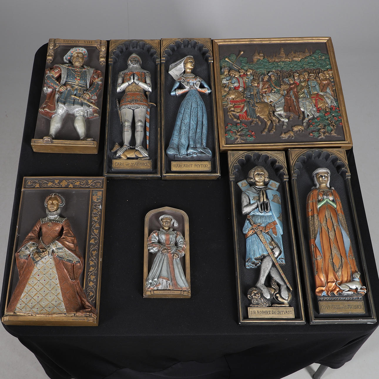 EIGHT COMPOSITE 'MARCUS' DESIGNS WALL PLAQUES.