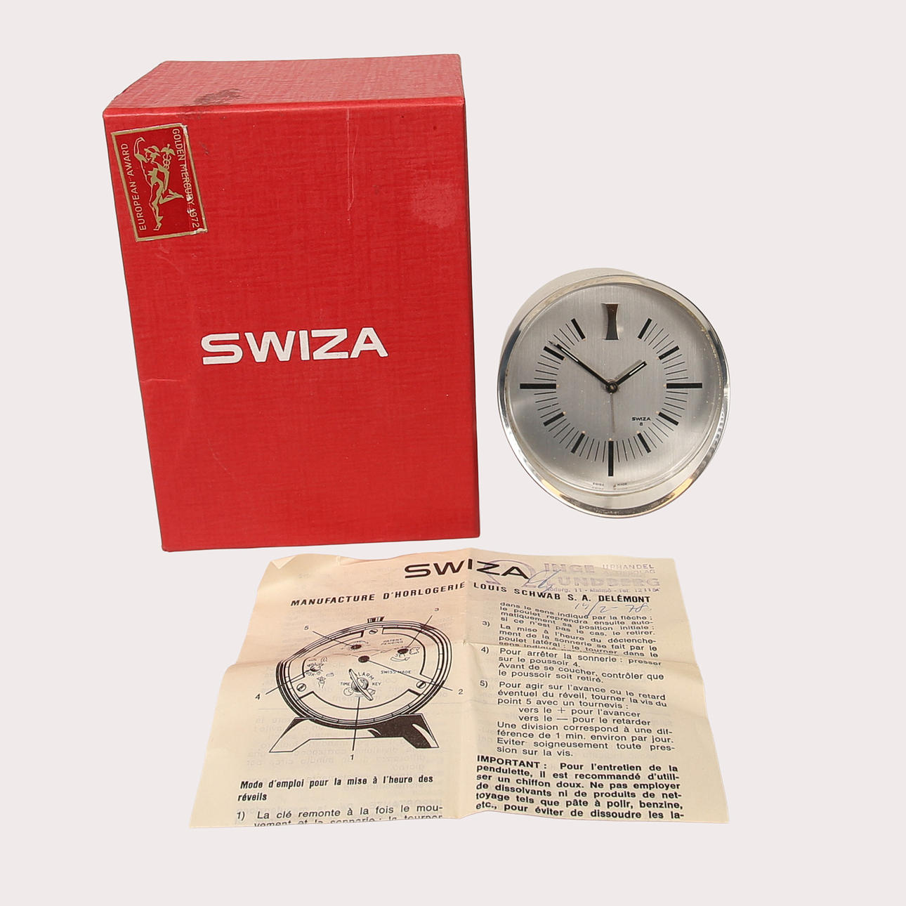 TABLE CLOCK WITH WAKE FUNCTION, metal with brushed surface, Swiza. Original carton in 1972.