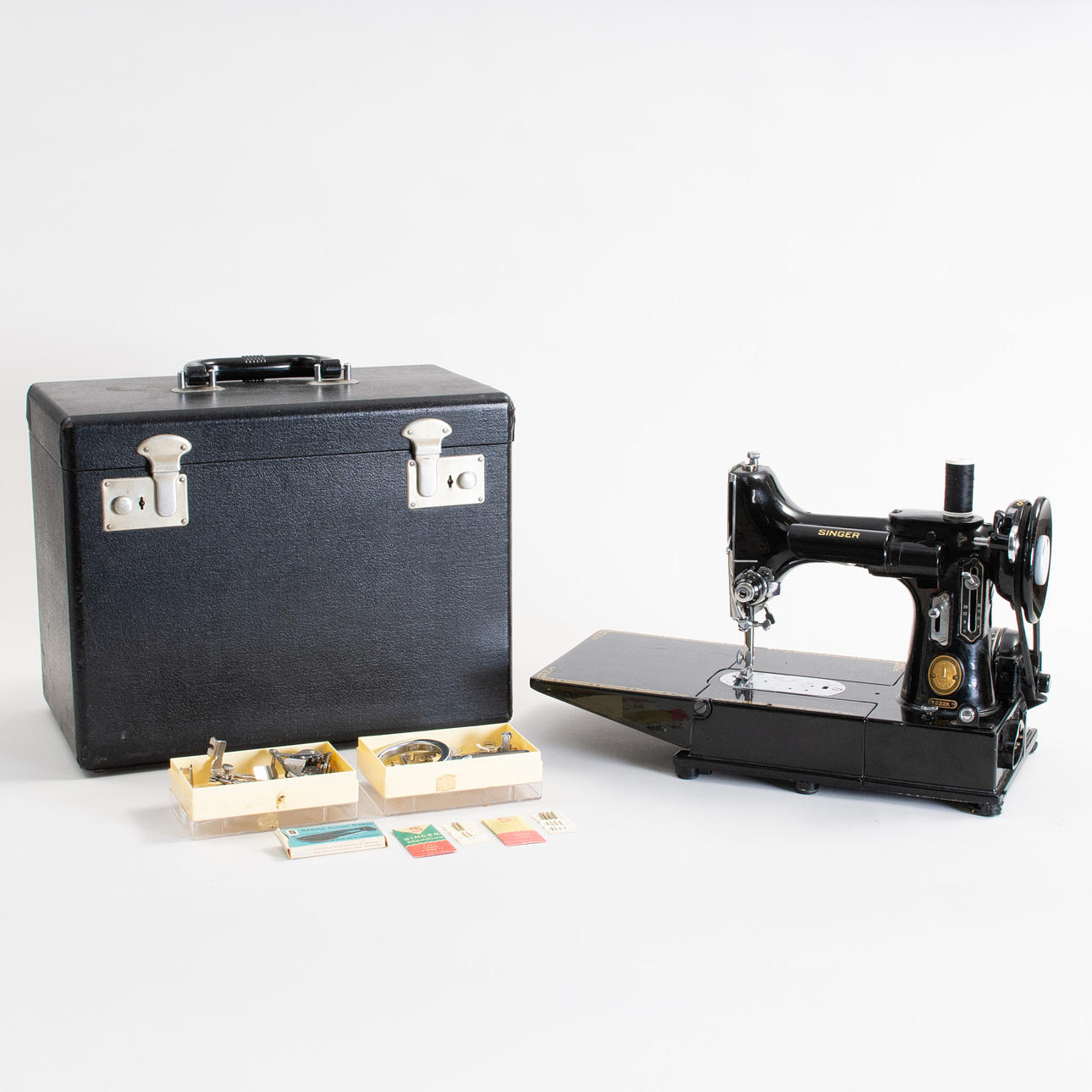 SINGER FEATHERWEIGHT MODEL 222K sewing machine with accessories.