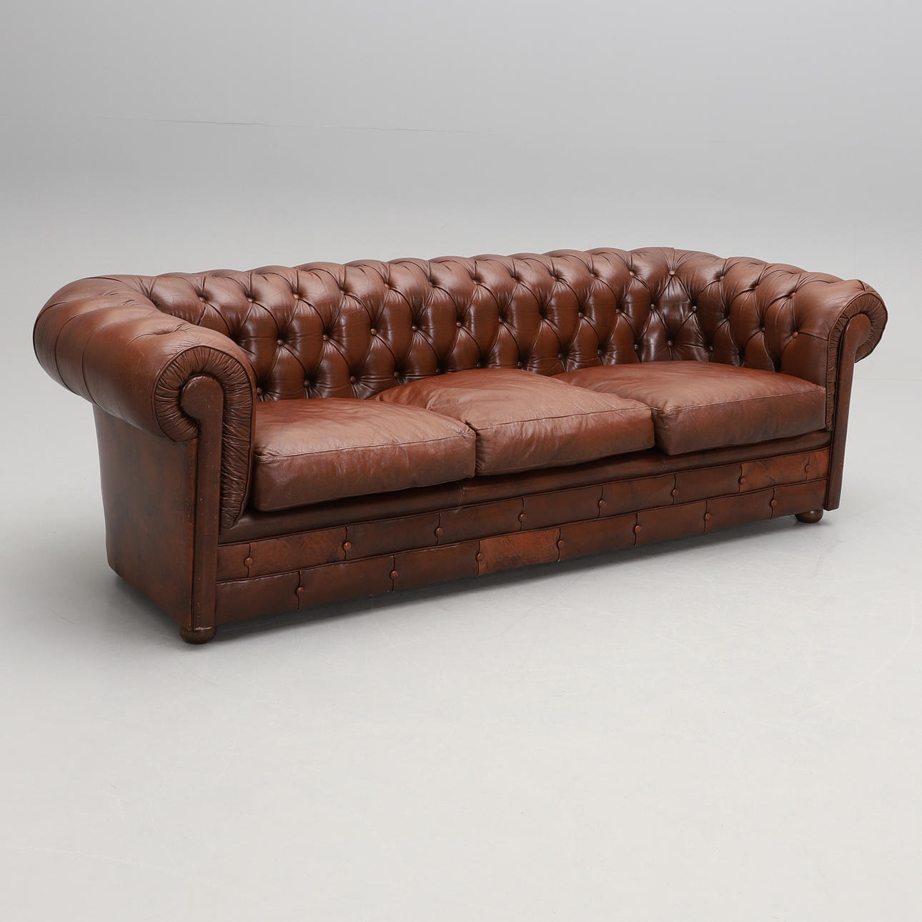 A Chesterfield sofa.