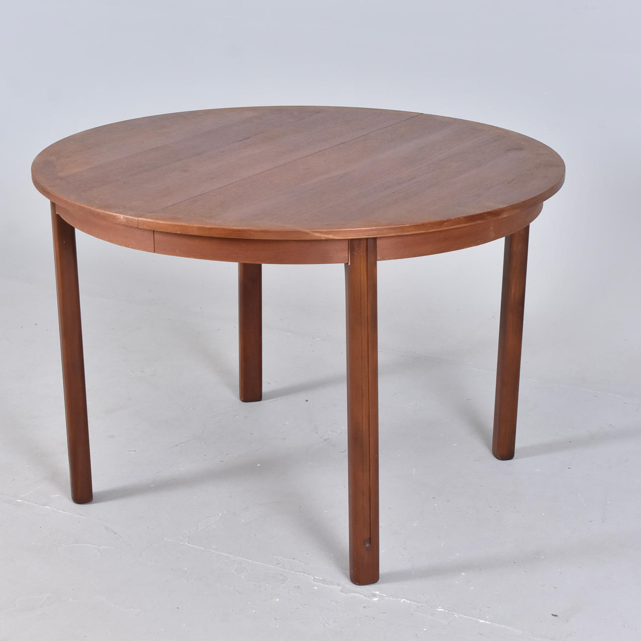 A teak dining table, mid 20th century.