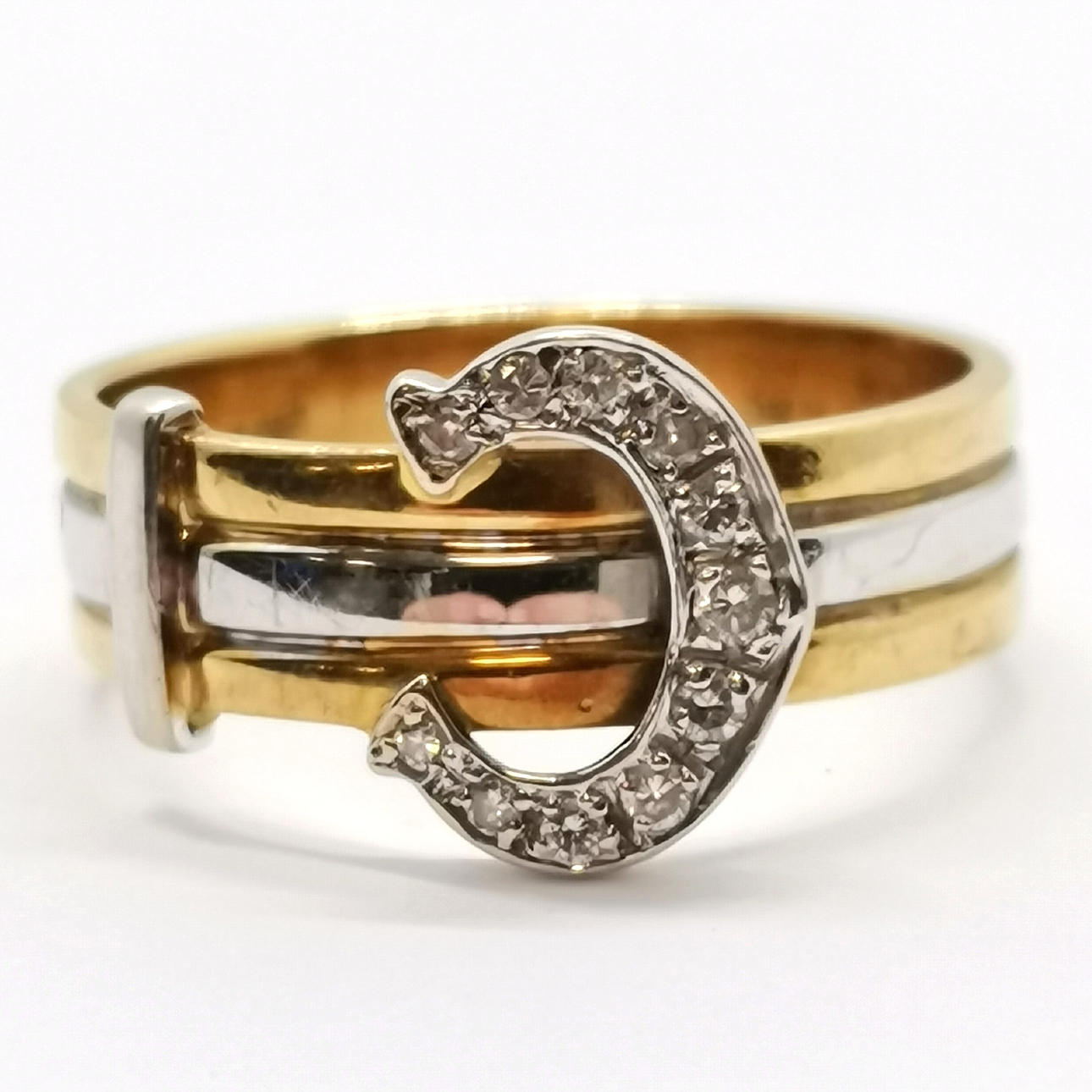 18ct GOLD DIAMOND SET BUCKLE RING.