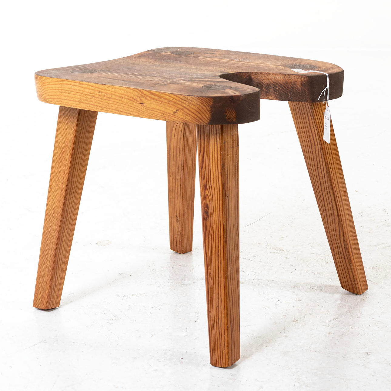 A pine stool, second half of the 20th century.