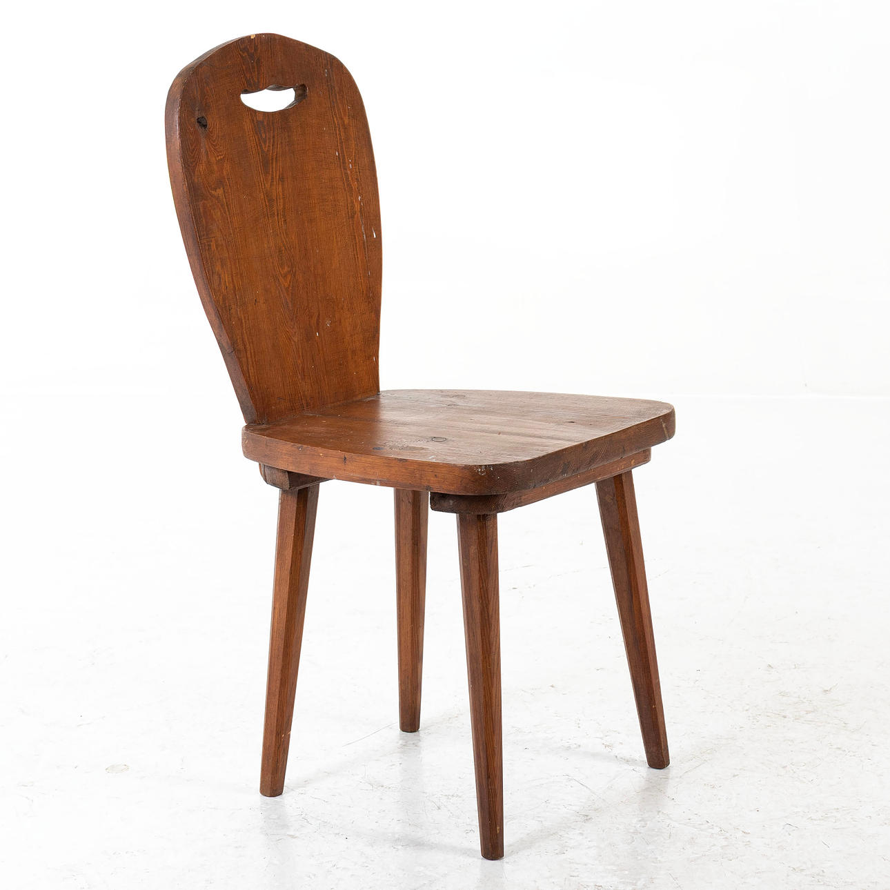 A mid 20th century pine chair.