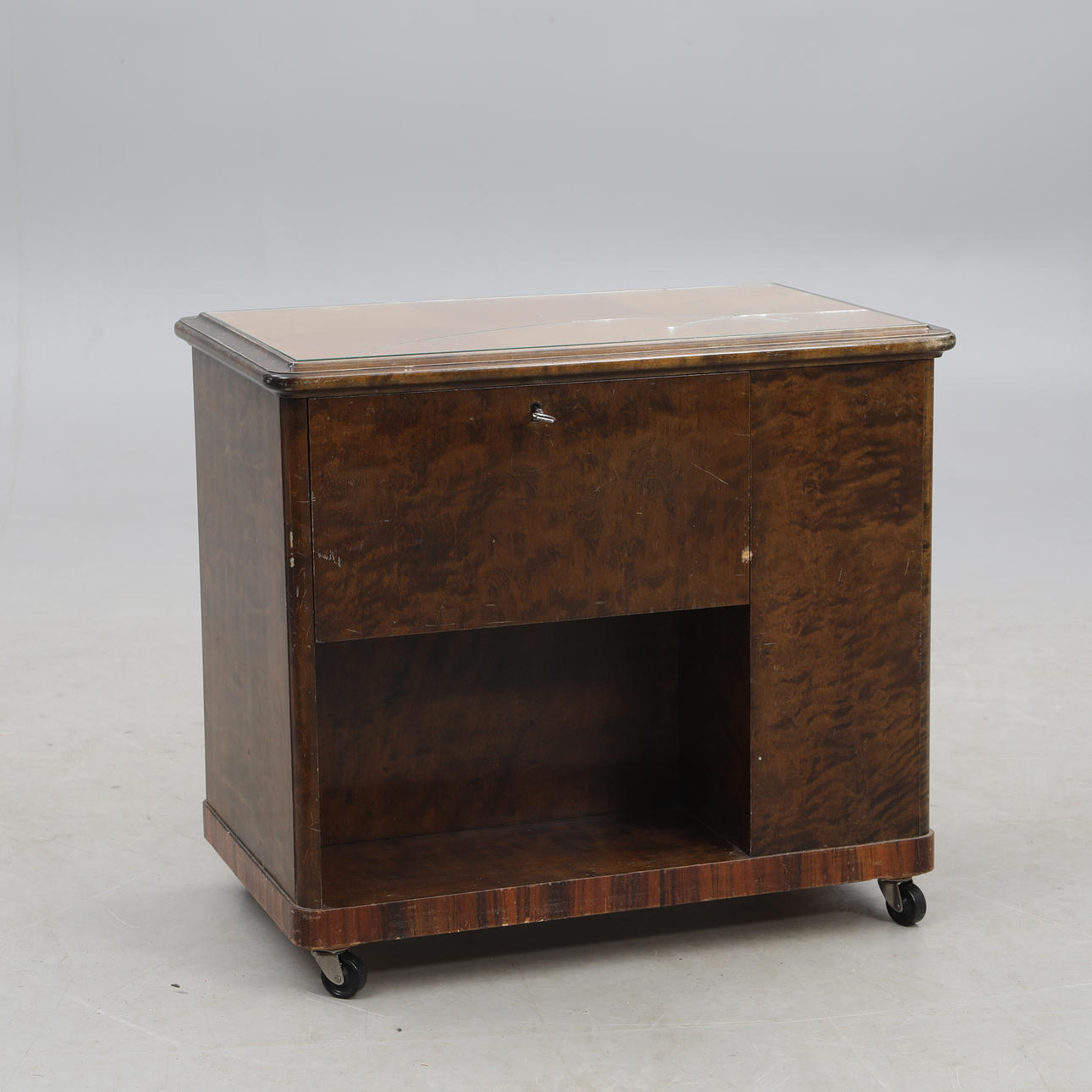 A stained birch bar cabinet, 1930s/40s.