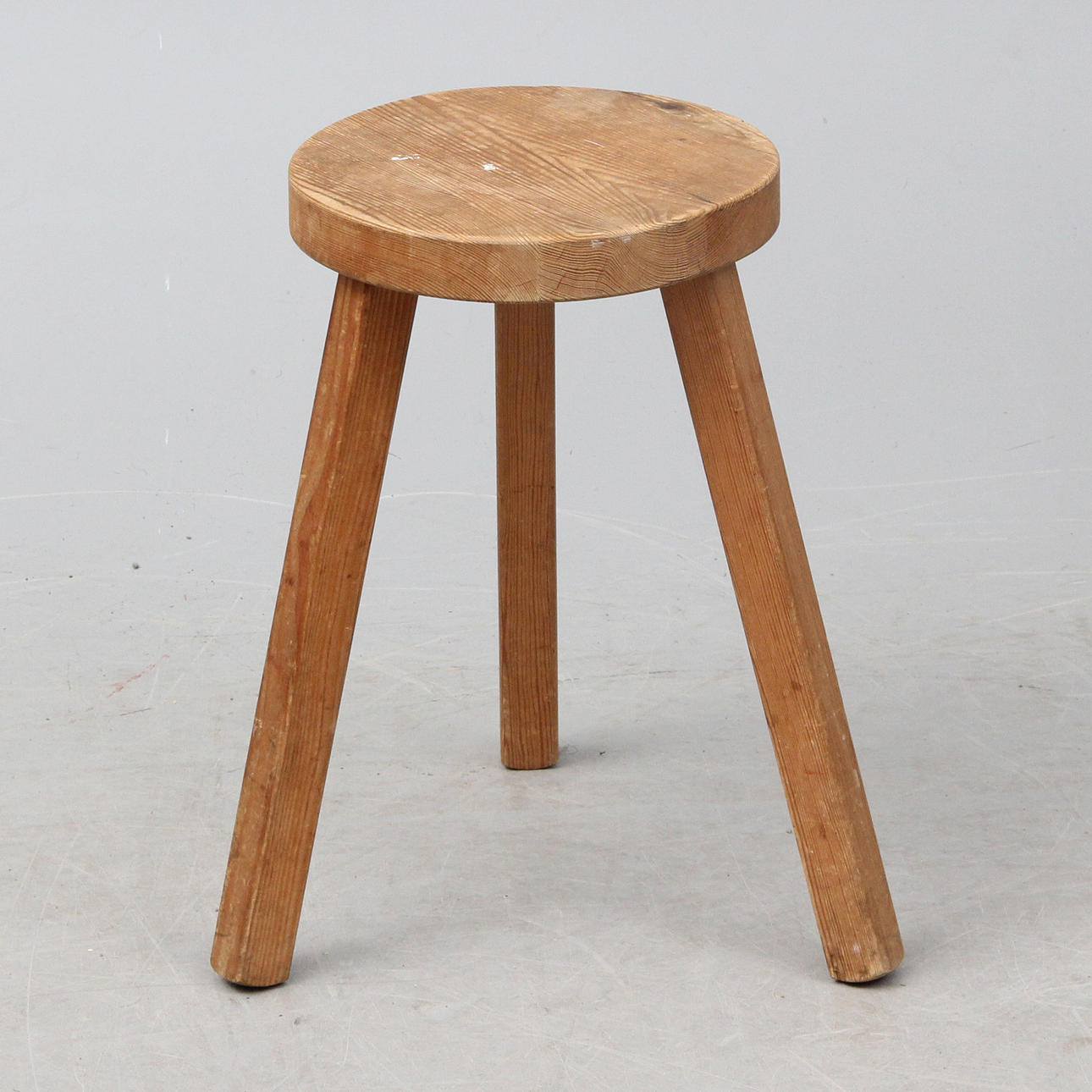 A 20th century pine stool.