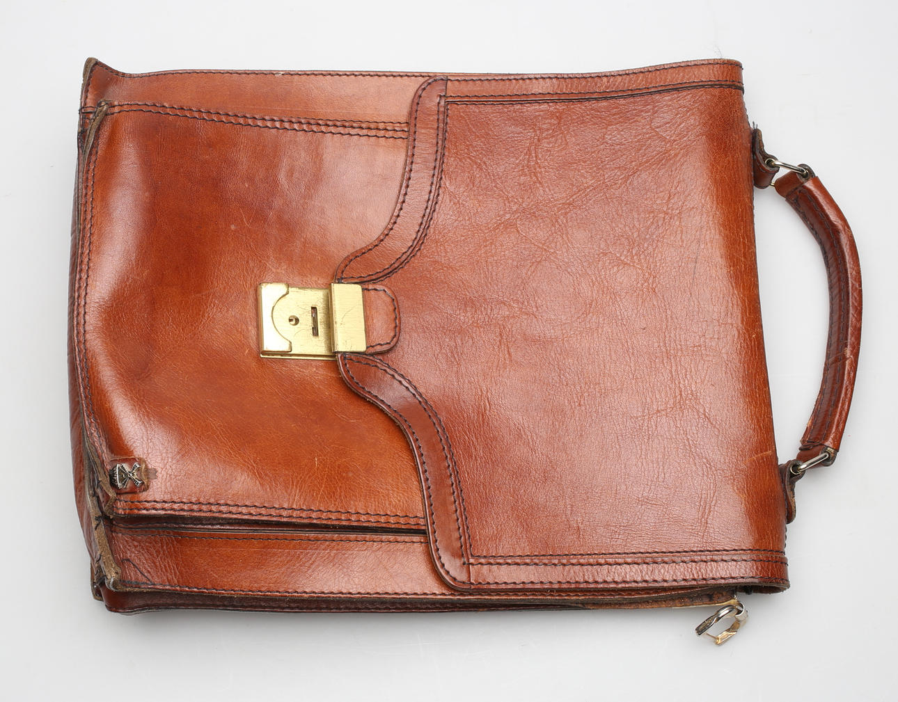 PORTFÖLJER, 2 st, skinn, 1900-tal.