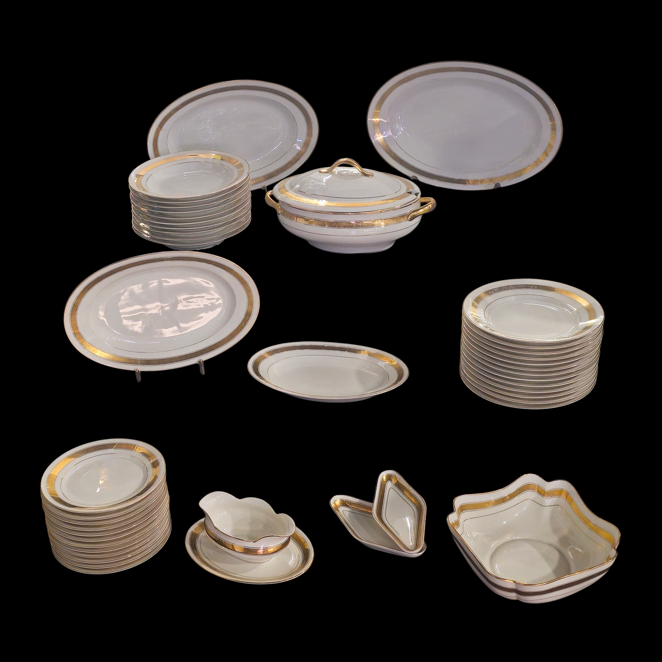 Porcelain tableware with gold trim.