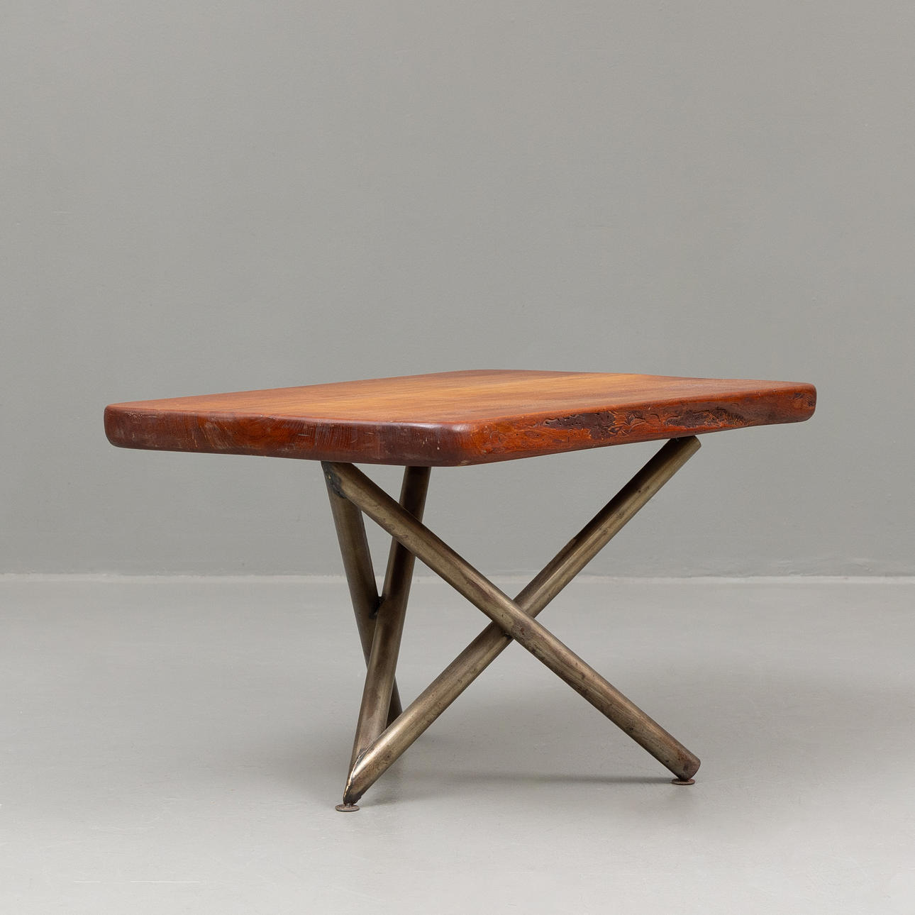 A late 20th century solid teak table.