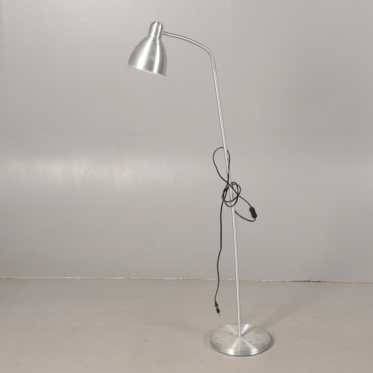 AN ALUMINIUM ADJUSTABLE LAMP.