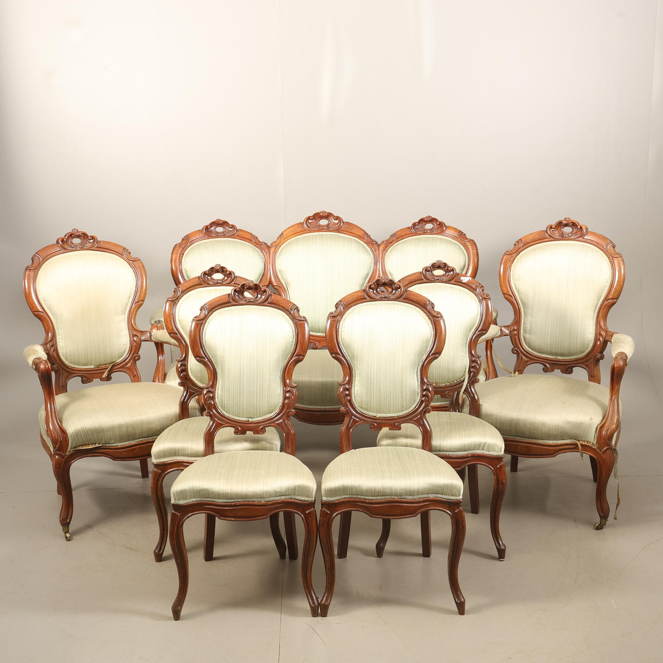 A seven-piece rococo style sofa set, 19th century.