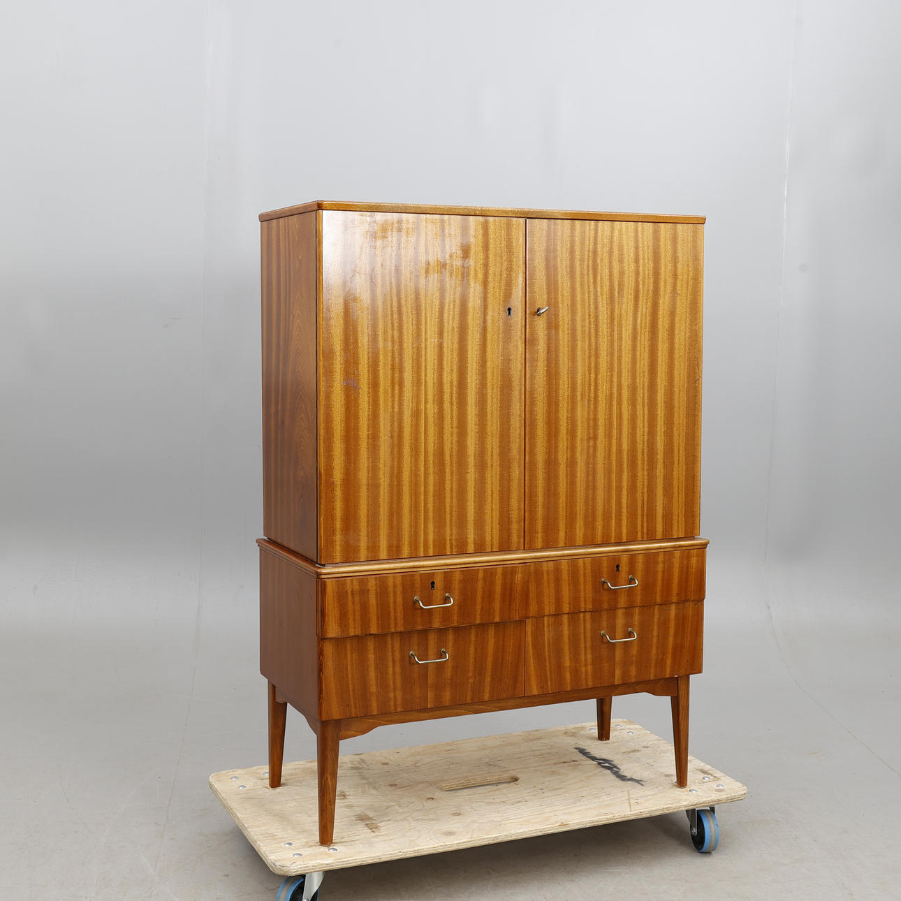 A teak cabinet, 1950s/60s.