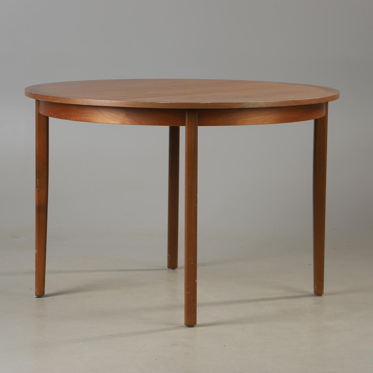 A walnut dining table, second half of the 20th century§.