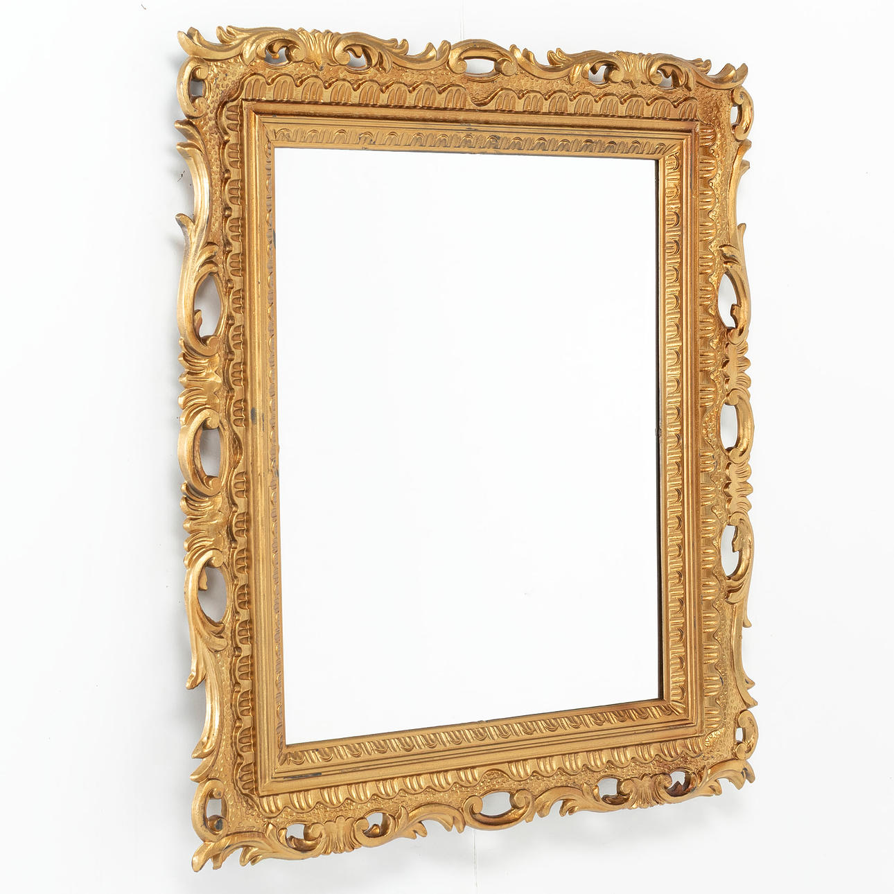 MIRROR, gold colored, plastic.