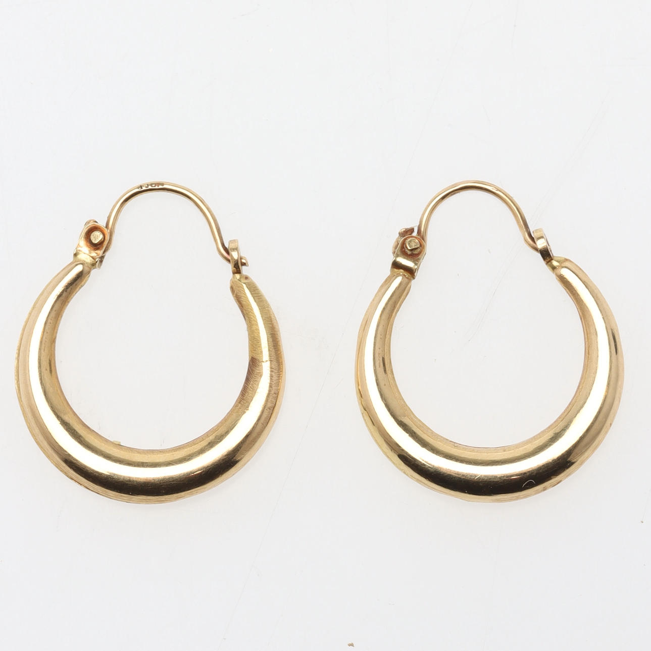 EARRINGS, a pair, 18K gold, creoles.