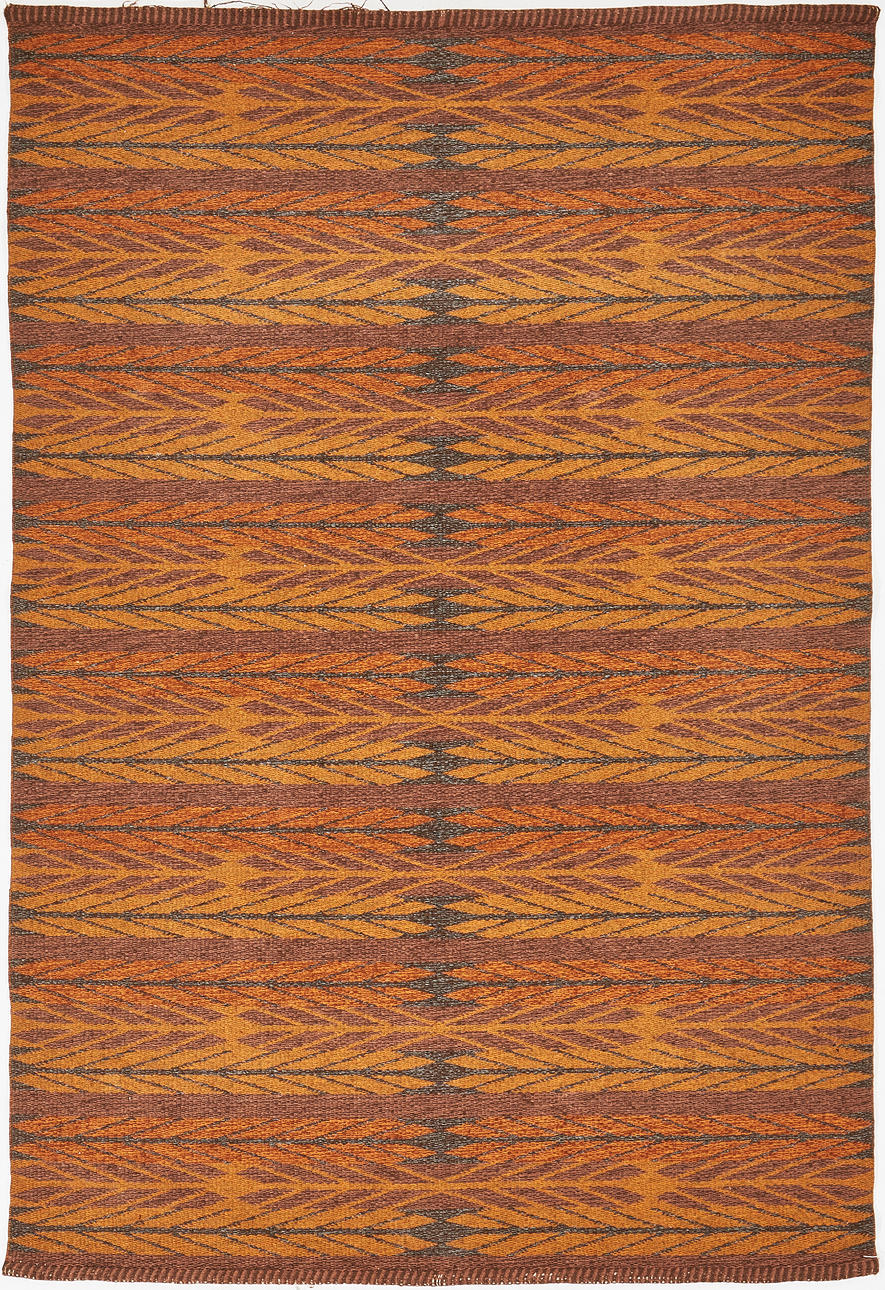 A mid 20th century carpet with yarrow.