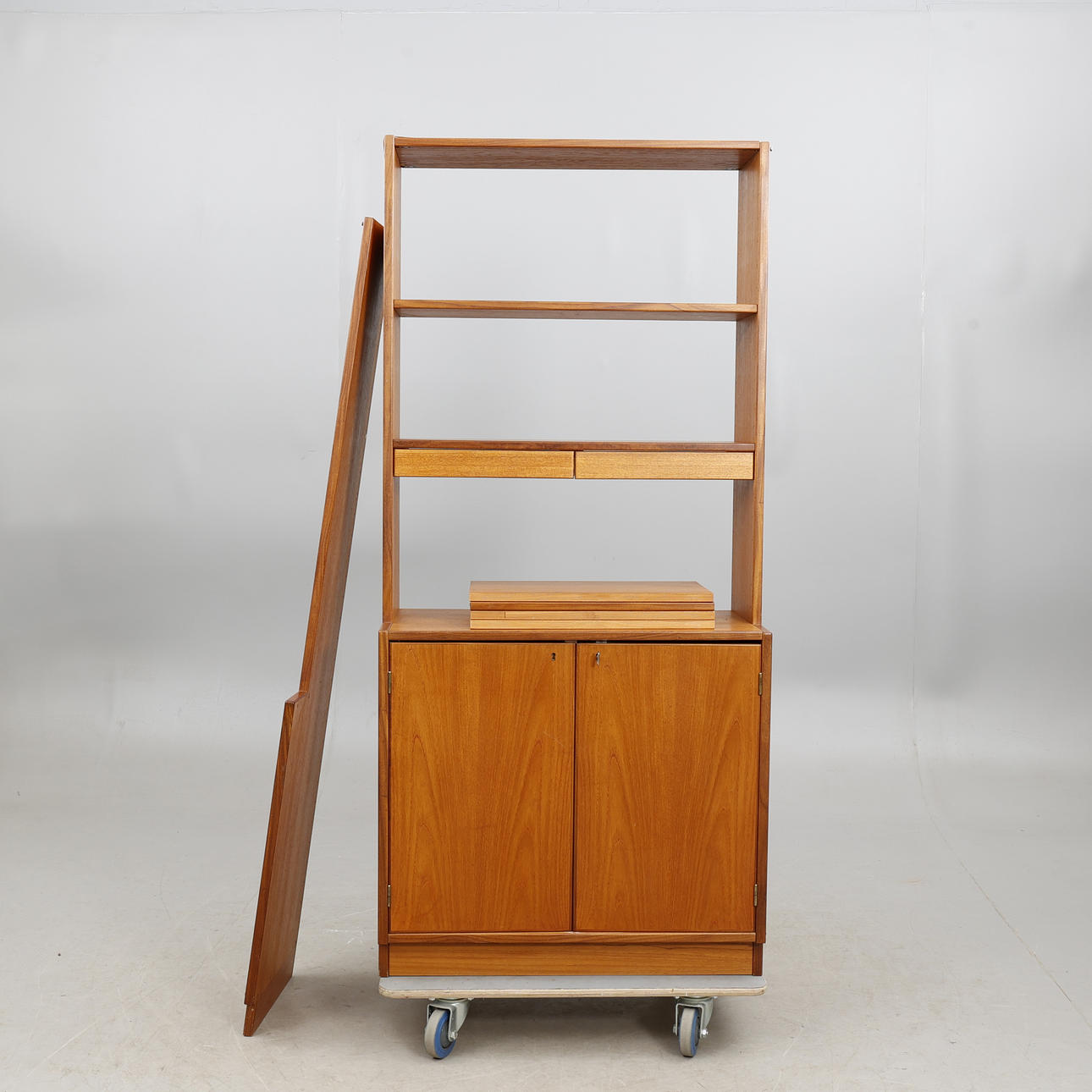 Bookcase with cupboard, 2 sections, teak, 1960/70s.