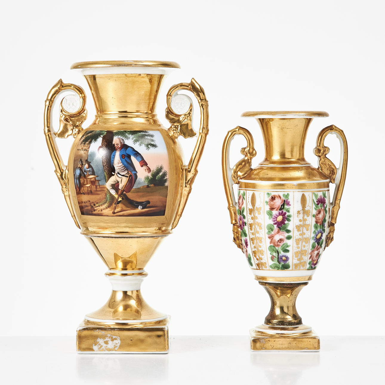 Two 19th century empire-style urns.
