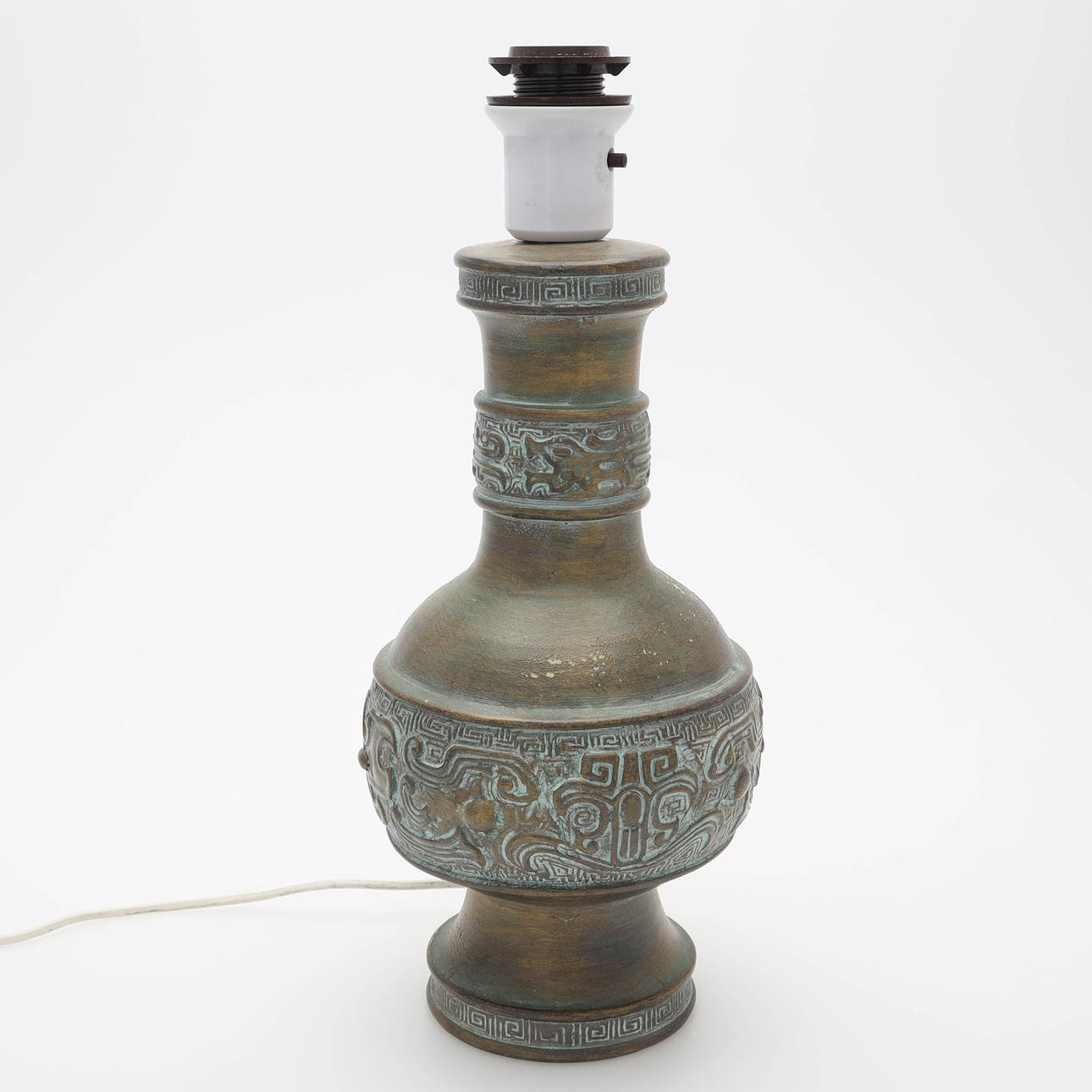 A ceramic table lamp, relief decor, Italy.