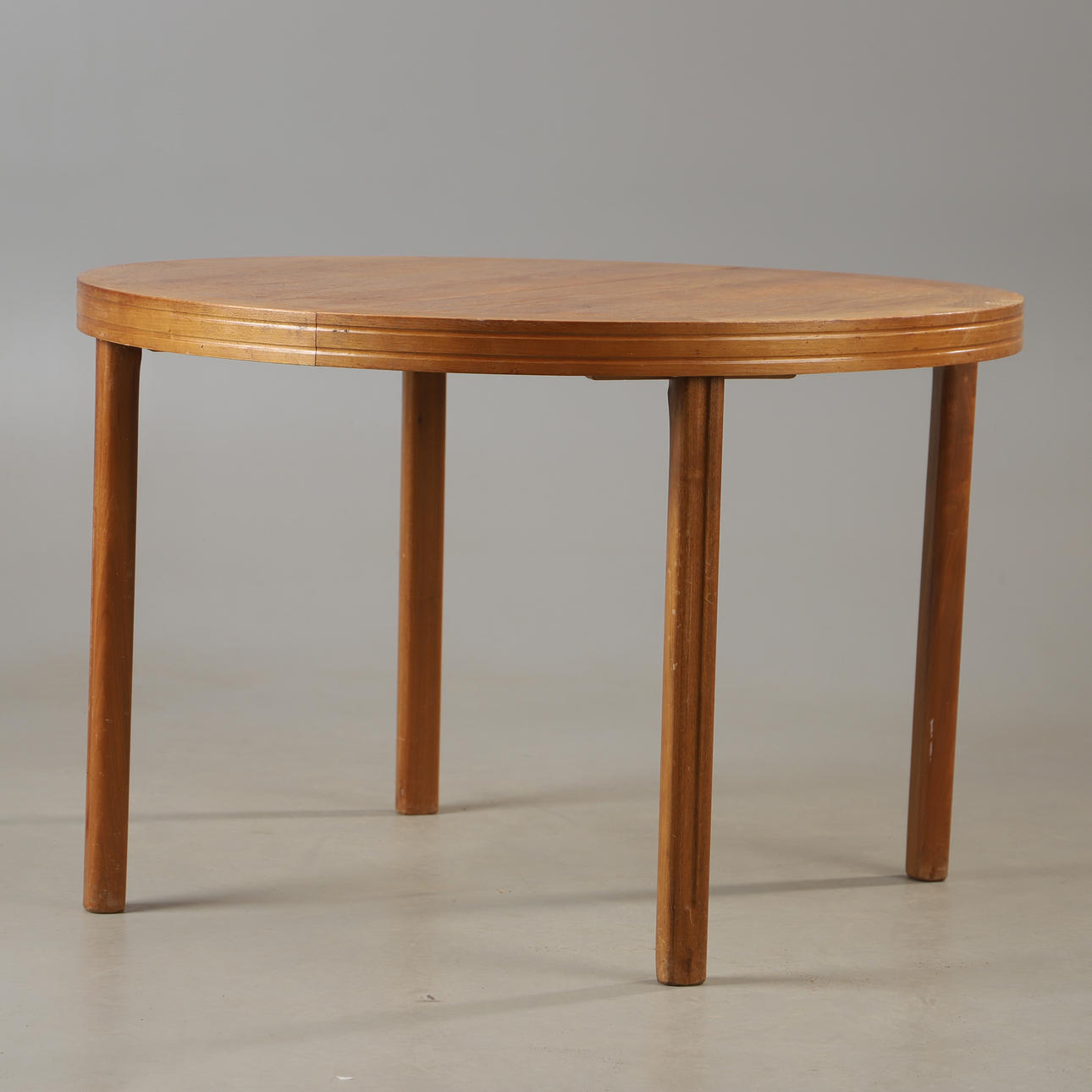 A walnut dining table, second half of the 20th century.
