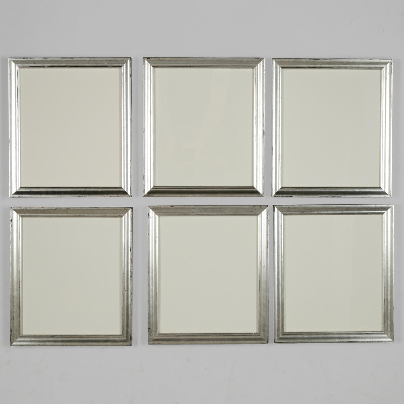 OVE OLSEN. Handmade silver-coloured wooden frames (6).