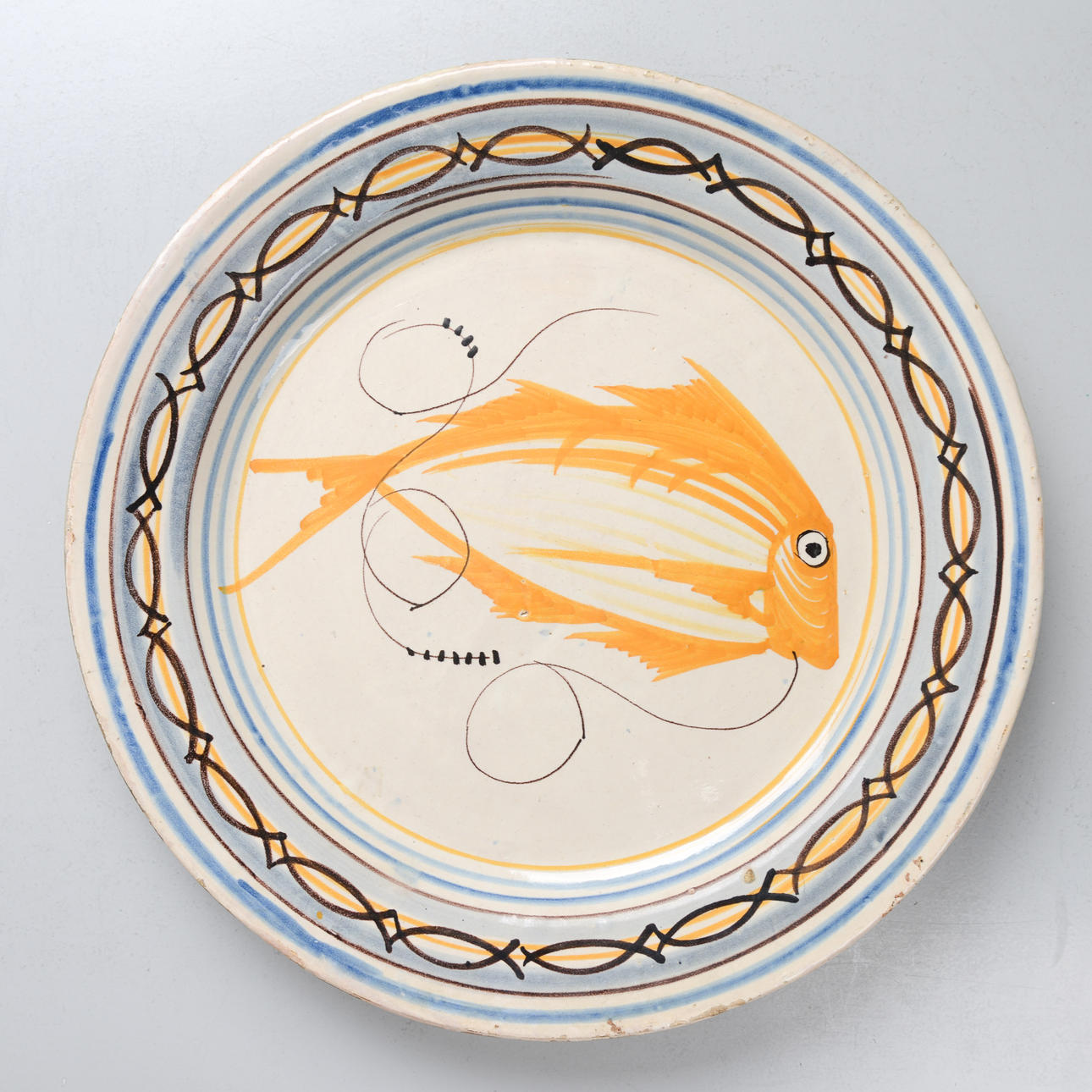A Portuguese earthenware dish, 19th century.