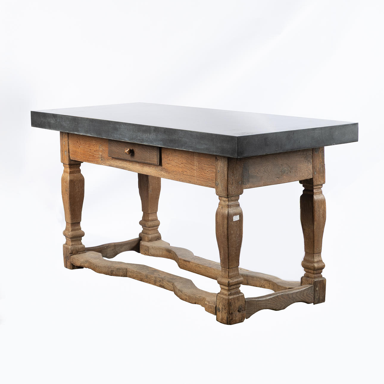 A 17th/19th century stone table, later disc.